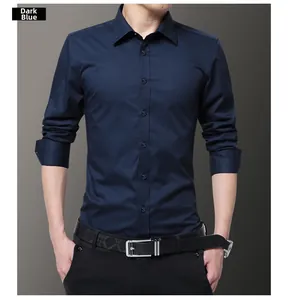 Detail of navy blue slim fit men's dress shirt featuring a classic collar and smooth fabric