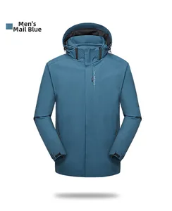Detail view of misty blue waterproof hooded jacket with EXPLORE logo and adjustable cuffs