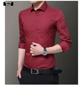 Detail of slim fit burgundy business shirt with classic collar and white buttons