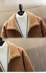 Detail view of coffee suede jacket featuring beige faux shearling collar and metal zipper