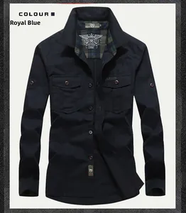 Detail of royal blue work shirt with dual chest pockets and inner plaid collar accents