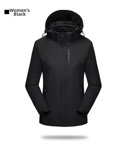 Detail of a black women's outdoor jacket featuring a hood and EXPLORE text on the chest