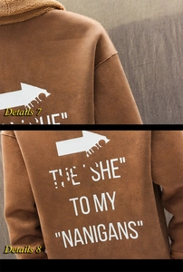 Close-up of brown suede jacket with white graphic print and soft lamb wool collar lining