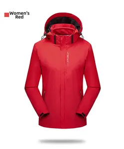 Detail of red women's outdoor jacket featuring adjustable drawstring hood and logo
