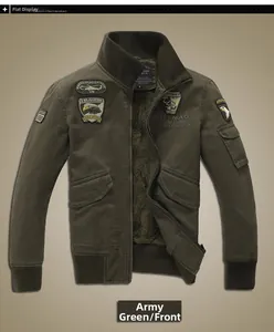 Detail of army green bomber jacket featuring military patches and warm fleece lining