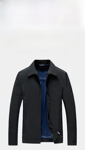 Detail of men's business jacket showing inner blue striped lining and zipper closure