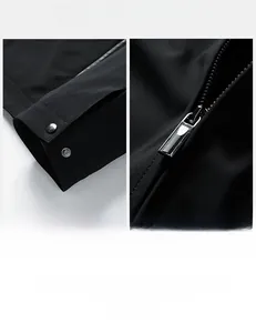 Detailed macro view of metal zipper and button cuffs on black 3D cut men's jacket