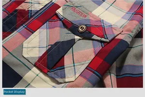 Detail of red and blue plaid shirt featuring a flap pocket with Fashion embroidery