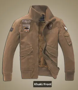 Detail of khaki military flight jacket showing thick faux shearling lining and embroidery