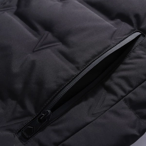 Men's matte black puffer jacket detail with metallic fashion zipper and textured fabric
