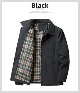 Macro shot of men's black cotton jacket with vintage plaid lining and collar detail