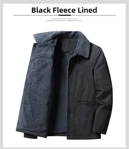 Detail of men's black cotton work jacket with warm fleece lining and classic collar
