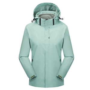 Women's mint green 3-in-1 outdoor jacket with adjustable hood and windproof fabric