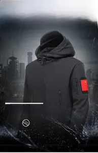 Detail of waterproof tactical softshell jacket with Velcro cuffs and arm flag patch