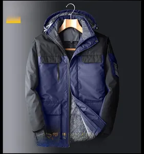 Detail of windproof hiking jacket with grey thickened fleece lining and navy patchwork