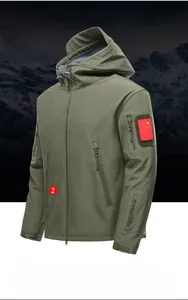 Detail view of military green tactical softshell jacket with six functional zipper pockets