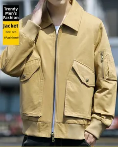 Close-up of khaki utility jacket with large pockets and metal sleeve zipper detail