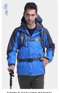 Detail of royal blue outdoor jacket with drawstring hood and functional zipper pockets