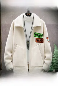 Detailed view of winter fleece jacket with WAND patch and full-zip turn-down collar