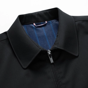 Men's minimalist black business jacket with stand collar and tricolor stripe detail