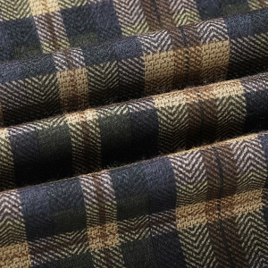 Classic green plaid cotton jacket fabric with detailed herringbone texture and warm wool feel