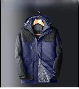 Detail of waterproof outdoor jacket showing navy blue fabric and gray fleece lining