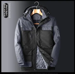 Detail of men's winter jacket showing waterproof shell and thick grey fleece lining