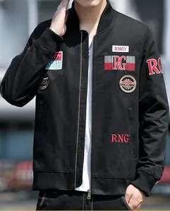 Close-up of military cargo jacket with embroidered patches and ribbed cuffs on male model