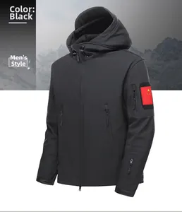 Detail of a black men's tactical softshell jacket with waterproof zippers and sleeve patches