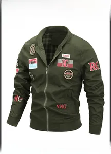 Detail of military bomber jacket with embroidered badges and ribbed collar in army green