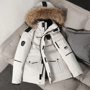 Parka d'hiver blanche unisexe avec col en fourrure et poches cargo utilitaires