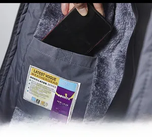 Detail of waterproof jacket inner pocket with warm fleece lining and functional label