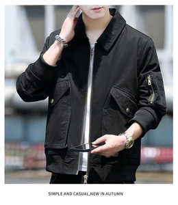 Detail of a black cotton bomber jacket featuring cargo pockets and ribbed cuffs for men