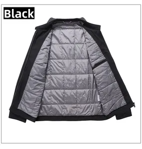 Detail of windproof black men's winter jacket with grey quilted lining and inner pocket