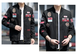 Detailed street-style view of men's black military bomber jacket with embroidery patches