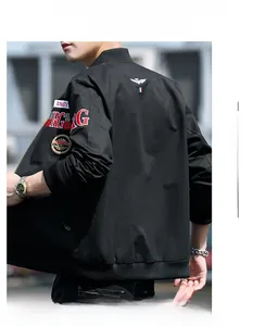 Detail view of military bomber jacket with embroidered RNGY patches on sleeves and back