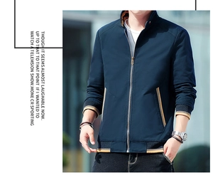 Detail of navy casual jacket showing yellow and black striped ribbed cuffs and hem trim