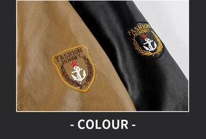 Detail of embroidered fashion badges on black and brown PU leather jacket sleeves