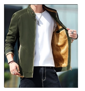 Detail view of men's olive jacket featuring warm camel fleece lining and striped ribbing