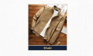 Detailed flat lay of khaki cotton casual jacket with ribbed cuffs on dark wood background