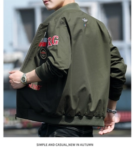 Detailed side view of military green bomber jacket with red and white RG embroidery