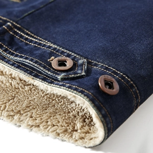 Deep blue denim jacket with warm white fleece lining and vintage copper buttons