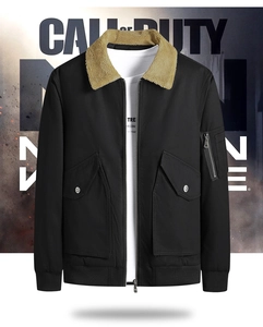 Detail of black winter pilot jacket featuring a warm brown faux sheepskin collar and zipper