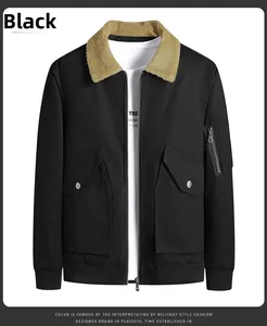 Detail of black military style jacket featuring a faux fur collar and MA-1 sleeve pocket