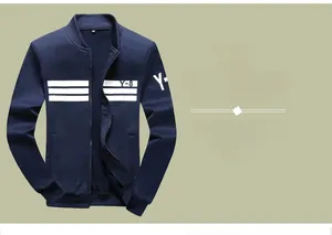 Close-up of navy blue sports jacket with white stripes and Y-8 letter printing on sleeves