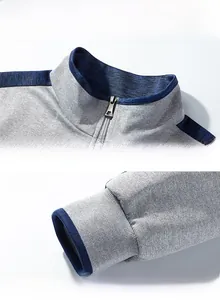 Detail of high-quality stand collar, metal zipper, and ribbed cuffs on sporty jacket