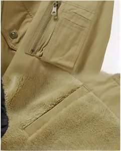 Detail of men's jacket showing arm zipper pocket and warm thick fleece lining with inner pocket