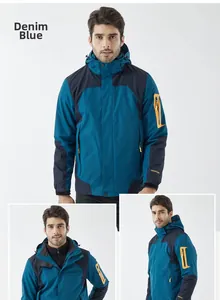 Detail of outdoor waterproof jacket in denim blue with hood and zipper pockets