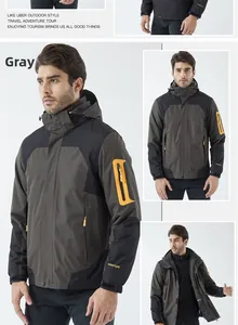 Detail of gray waterproof jacket with yellow zippers and adjustable velcro cuffs