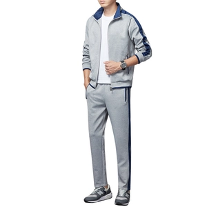 Men's light grey two-piece casual sports suit featuring a zip jacket and matching pants